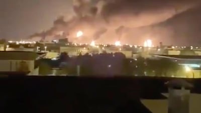 Smoke fills the sky at the Abqaiq oil processing facility. AP
