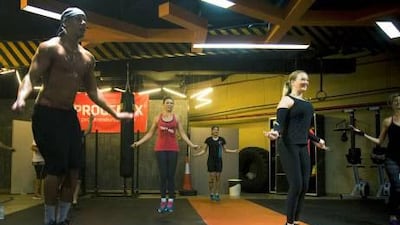 Katie Pattison-Hart (in red) and fellow crossfit fans skip at a gym in Al Quoz to help raise awareness about human trafficking.