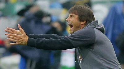 Chelsea manager Antonio Conte gestures to his players. Heinz-Peter Bader / Reuters