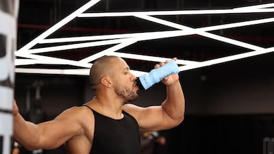 Ciryl Gane takes a break from training at the Tripl3 Gym in Dubai.