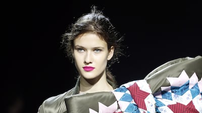 American quilting techniques have been used to make an oversized bow for Viktor & Rolf. Photo by Thierry Chesnot / Getty Images