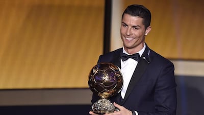 Real Madrid's Cristiano Ronaldo smiles after receiving the 2014 Fifa Ballon d'Or award on Monday night. Fabrice Coffrini / AFP