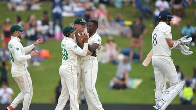 Kagiso Rabada, second right, took four wickets in the second innings including Stuart Broad's, right, to win the match for South Africa. Getty Images