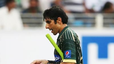Pakistan batsman Misbah-ul-Haq walks off the pitch after he was dismissed during the second one-day international against Australia in Dubai on October 10, 2014. Kamran Jebreili / AP Photo