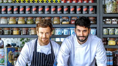 Tom Aikens, left, at Pots, Pans & Boards with head chef Ibraheem Musleh. Victor Besa for The National