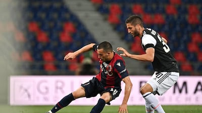 Bologna's Nicola Sansone controls the ball against Juventus' Rodrigo Bentancur. AP