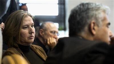 The Israeli justice minister Tzipi Livni, left, and finance minister Yair Lapid, right, opposed the bill approved by the cabinet on November 23, 2014. Jim Hollander / AP Photo