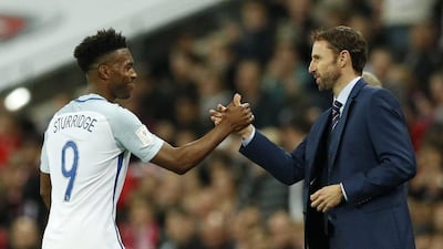 England's Daniel Sturridge shakes hands with interim manager Gareth Southgate as he is substituted. John Sibley / Action Images / Reuters / October 8, 2016