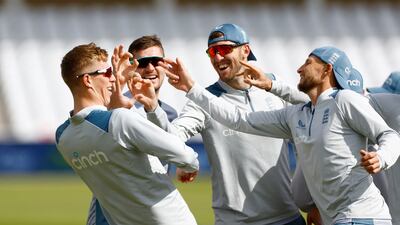 England's Joe Root with Craig Overton, Zak Crawley and teammates during practice. Reuters