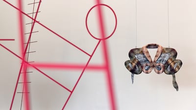 A bodiless snake charmer is among the cast of unruly characters in Makhacheva's 'Charivari'.