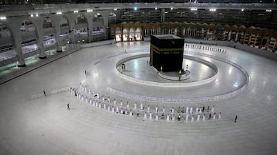 A small group of worshippers pray at the Kaaba in the Grand Mosque in Makkah, Saudi Arabia. Reuters