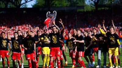 Union Berlin players celebrate after qualifying for the Champions League. EPA