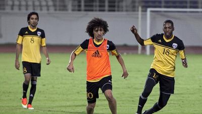 Omar Abdulrahman, centre, has been sidelined with a knee injury since the start of February. Silvia Razgova / The National