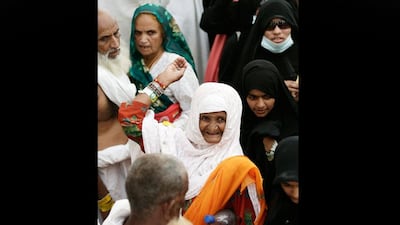 A Muslim throws a stone at a pillar in a ritual called Jamarat, the last rite of the annual haj, the Islamic faith's most holy pilgrimage. Hassan Ammar / AP Photo