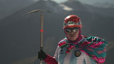 Camila Tarqui Llusco, an Aymara indigenous woman member of the Climbing Cholitas of Bolivia Warmis, on the summit of the 6,088-metre Huayna Potosi mountain, near El Alto, Bolivia. All photos AFP