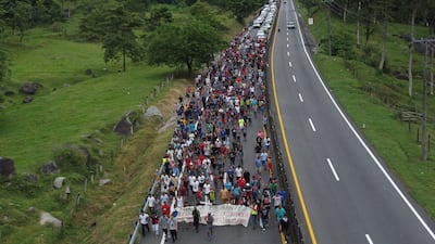 A migrant caravan bound for the US advances towards the town of Huixtla, in Mexico's Chiapas state. EPA