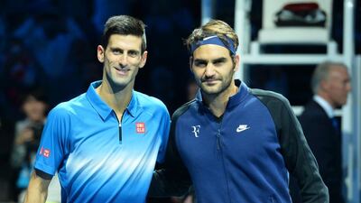 Roger Federer, right, has denied he hired Ivan Ljubicic as coach with the sole purpose of beating rival Novak Djokovic, right. Glyn Kirk / AFP