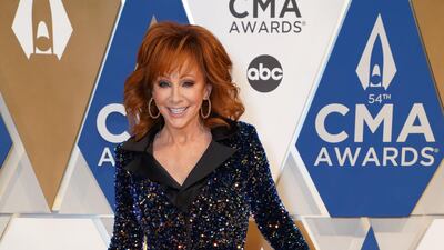 Host Reba McEntire arrives at the 54th annual Country Music Association Awards in Nashville, Tennessee. Reuters