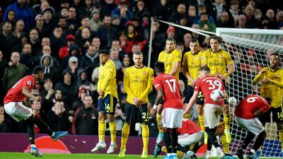 epa07883624 Manchester United's Marcus Rashford (L) takes a free kick during the English Premier League soccer match between Manchester United and Arsenal London in Manchester, Britain, 30 September 2019. EPA/PETER POWELL EDITORIAL USE ONLY. No use with unauthorized audio, video, data, fixture lists, club/league logos or 'live' services. Online in-match use limited to 120 images, no video emulation. No use in betting, games or single club/league/player publications