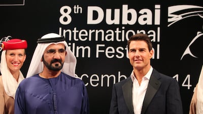 Sheikh Mohammed bin Rashid, Vice President and Ruler of Dubai, with Tom Cruise at the Dubai International Film Festival premiere of Mission Impossible: Ghost Protocol in 2011. Pawan Singh / The National