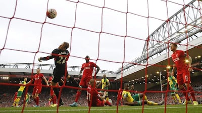 The goal from Norwich City’s Russell Martin, left, on Sunday proves Liverpool’s set-piece struggles have become the norm. Phil Noble / Reuters
