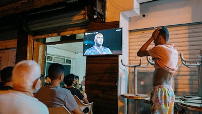 An fan reacts in disbelief as Esperance player Ilyes Chetti is sent off after being shown a red card. Erin Clare Brown / The National