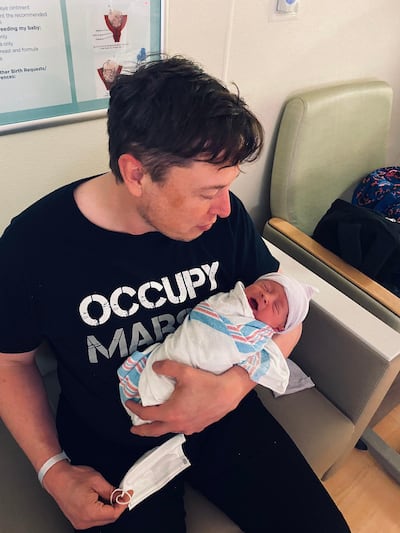 Elon Musk with his baby boy, who is named X Æ A-Xii Musk. Twitter / Elon Musk