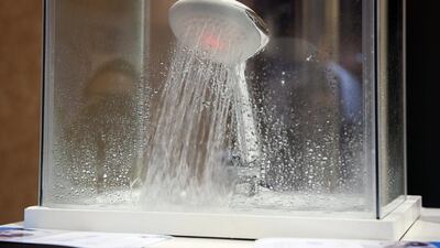 The Hydrao Eco-Sensitive Smart Shower. The shower records water usage on an app for a mobile device and can light up in different colours to notify the user of amount of water used. John Locher / AP Photo