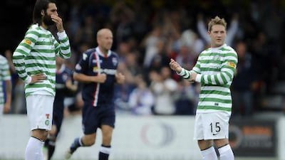 Celtic, above with Georgios Samaras, left, and Kris Commons, are not running away in the Scottish Premier League as many expected after Glasgow Rangers' relegation to the Third Division. Russell Cheyne / Reuters