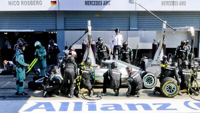 Mercedes driver Lewis Hamilton gets a pit stop during the Italian Grand Prix. Srdjan Suki / EPA