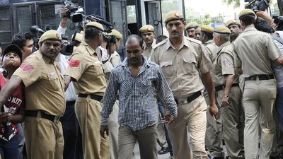 Mukesh Singh, centre, and three other men were convicted for the Delhi bus rape in a fast-track court in 2013. They are appealing their death sentences Sunil Saxena / Hindustan Times via Getty Images