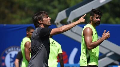 Antonio Conte insists he is delighted with his midfield options, particularly since the arrival of N'Golo Kante. Mark Ralston / AFP