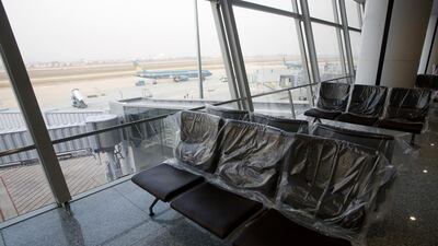 Vietnam Airlines airplanes are parked at the new terminal of Noi Bai international airport in Hanoi. Kham / Reuters