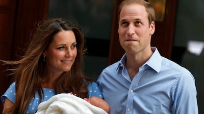 Britain's Prince William and Kate, Duchess of Cambridge pose for photographers with the Prince of Cambridge. AP Photo / Lefteris Pitarakis