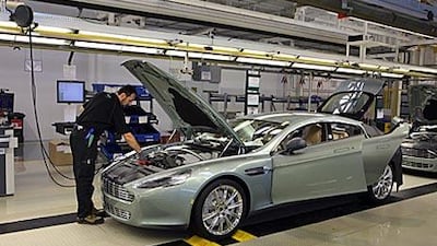 An Aston Martin Rapide on the production line in Austria. The car maker has outsourced the manufacture of its new four-door saloon to the Magna Steyr factory in Graz.