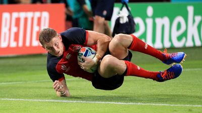 England's Ruaridh McConnochie scores his sides fifth try. Press Association