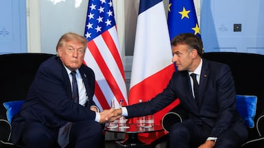US President Donald Trump (L) shakes hands with French President Emmanuel Macron during a bilateral meeting on the sidelines of the G7 summit in Evian-les-Bains, central-eastern France, 15 June 2026. The 52nd G7 Summit takes place in Evian-les-Bains from 15 to 17 June 2026. EPA / LUDOVIC MARIN / POOL MAXPPP OUT