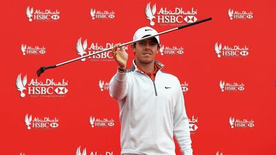 Rory McIlroy practices some local dancing on Tuesday ahead of the Abu Dhabi HSBC Golf Championship, which starts Thursday. Michael Lewis / Getty Images