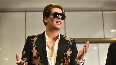 Facebook banned Milo Yiannopoulos, above, Louis Farrakhan, far-right activist Alex Jones and several others in a crackdown on hate content. AFP