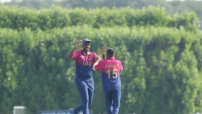 UAE captain Aayan Afzal Khan celebrates after taking the wicket of Jishan Alam of Bangladesh.