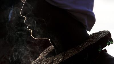 A Nepalese devotee sits with oil lamps on his body, made as an offering during Dashain Festival celebrations at the Baramahini Temple in Bhaktapur, Nepal. During the 15-day Dashain Festival, Nepalese Hindu devotees worship Durga, a mother goddess of power and prosperity, offering animal sacrifices, especially goats and buffalo. In general, the Dashain Hindu festival is a celebration of the victory of the gods over demons, as told in several Hindu mythological texts. EPA