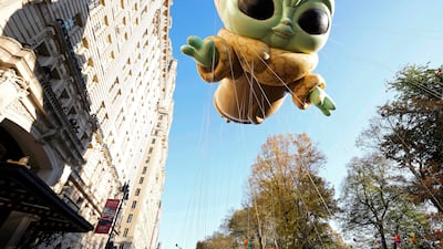 The Grogu or Baby Yoda balloon floats in the Macy's Thanksgiving Day Parade. AP