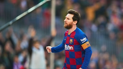 Barcelona striker Lionel Messi celebrates after scoring the second of his goals in a convincing win over Eibar. EPA