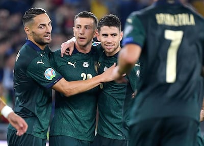 Federico Bernardeschi, centre, and Jorginho, right, were on target in the 2-0 qualifuing win over Greece. EPA