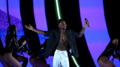 Young T and Bugsey perform during the Brit Awards at the O2 Arena in London. AFP