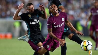 Manchester City's Gabriel Jesus in action with Real Madrid's Dani Carvajal. Lucy Nicholson / Reuters