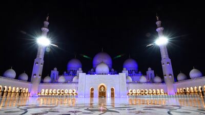 Sheikh Zayed Grand Mosque in Abu Dhabi is illuminated for Ramadan. Victor Besa / The National