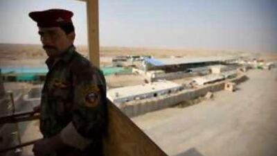 An Iraqi border police officer mans a watchtower at the Zurbatiya point of entry between Iran and Iraq.