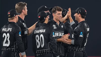 New Zealand's Mitchell Santner, second right, picked up five wickets after scoring a quick 36 against the Netherlands. AFP