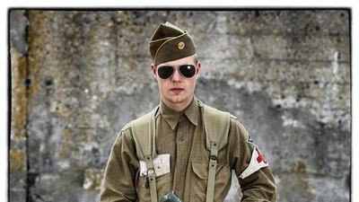 Theo Berton, from France, wears a replica uniform of an American 2nd Ranger Battalion.